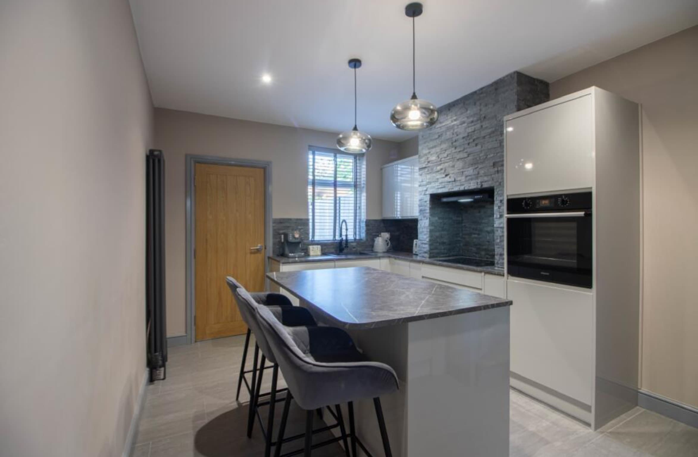 Derbyshire — kitchen island and cooking alcove